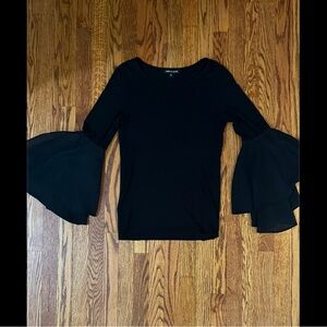 Woman’s black bell sleeve top.  Can be wornn dressy or casual